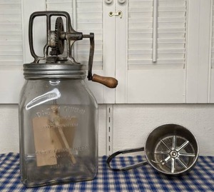 lot 42 image: Vintage Dazey Butter Churn and Vintage Foley Sifter