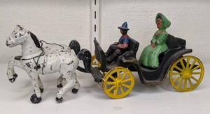 lot 39 image: Vintage Cast Iron Toy Horses and Buggy with Driver and Passenger