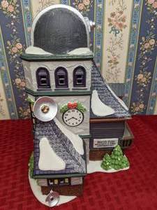 lot 209 image: Vintage Department 56 North Pole Series Weather and the Time Observatory