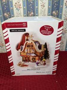 lot 203 image: Vintage Department 56 North Pole Series Augies Christmas Carols