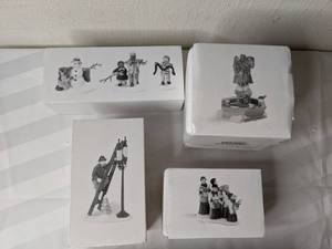 lot 290 image: Heritage Village Collection Playing in the Snow, Lamplighter Accessory Set, Spirit of the Season, Choirboys All-In-A-Row
