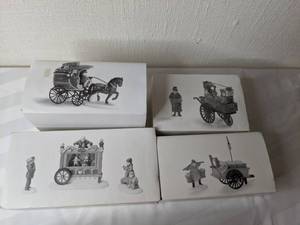 lot 293 image: Heritage Village Collection The Fezziwig Delivery Wagon, The Old Puppeteer, Chelsea Market Curiosities Monger & Cart, Chelsea Market Fish Monger & Cart