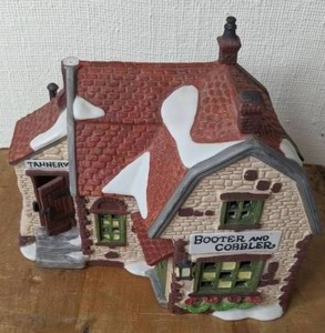 lot 250 image: Vintage Department 56 Heritage Village Collection, Dickens Village Series Booter and Cobbler