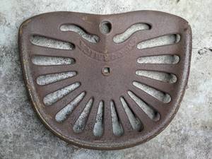 lot 680 image: Set of Two Antique Tractor Seats