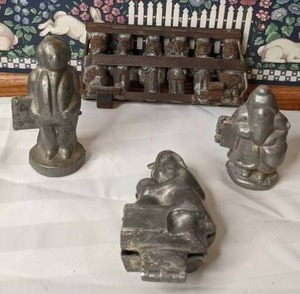 lot 624 image: Four Vintage Hinged Pewter Candy Molds - 6 in 1 Mold, Santa and More