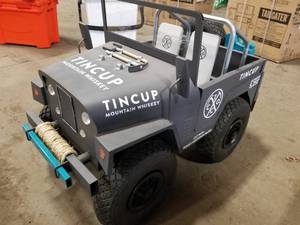 lot 533 image: Tin Cup Jeep Display