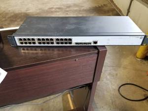 lot 311 image: HP ProCurve V1910-24G JE006A 24-Port Switch