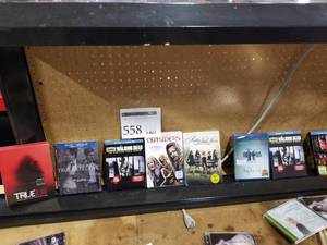 lot 558 image: Lot of (8) Adult MoviesTV Series - True Blood, True Detective, Walking Dead, Outsiders, Pretty Little Ladies, Lights Out, Warcraft