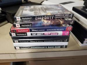 lot 428 image: Lot of (8) Sony PS2 Games - Call of Duty World At War, Call of Duty, Kingdom Hearts, Tony Hawks American Wasteland, Kingdom Hearts II, Fishermans Bass Club