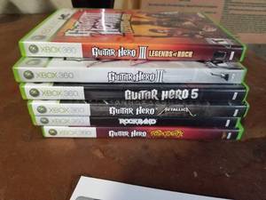 lot 450 image: Lot of (6) Microsoft Xbox 360 Games - Guitar Hero III Legends of Rock, Guitar Hero II, Guitar Hero 5, Guitar Hero Metallica, Guitar Hero Aerosmith, Rockband