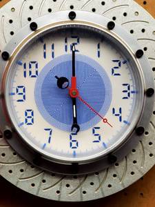 lot 37 image: 14 Round Plastic Barke Caliper  Rotor Clock