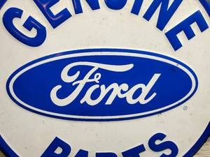 lot 101 image: 12 Round Pressed Tin Ford Sign