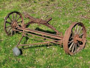 lot 146 image: Vintage Hay Wagon Axle Yard Decor