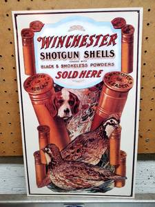 lot 203 image: Winchester Shotgun Shells 10 W x 16 H Tin Sign