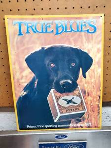 lot 199 image: Peters True Blue 12-12 W x 16 H Pressed Tin Sign