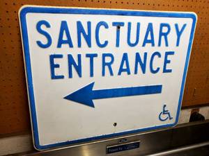 lot 235 image: Sanctuary Entrance Pressed Steel Street Sign