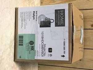 lot 16 image: Halyn 4.5 in. 1-Light Matte Black Indoor Wall Sconce with Vintage Brass Accents and Clear Glass Shade by Home Decorators Collection Customer Returns See Pictures