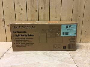 lot 27 image: Hartford Lake 13.75 in. 2-Light Oil Rubbed Bronze Rustic Farmhouse Bathroom Vanity Light with Linen Glass Shades by Hampton Bay Customer Returns See Pictures