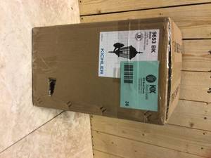 lot 36 image: Madison 19.75 in. 1-Light Black Outdoor Light Wall Sconce with Clear Beveled Glass (1-Pack) by KICHLER Customer Returns See Pictures