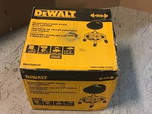 lot 63 image: 24 in. H x 16 in. W x 16 in. D Adjustable Shop Stool with Casters by DEWALT Customer Returns See Pictures