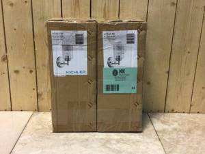 lot 83 image: Lot of 2 Winslow 1-Light Brushed Nickel Bathroom Indoor Wall Sconce with Clear Seeded Glass Shade by KICHLER Customer Returns See Pictures