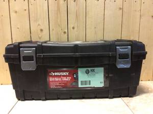 lot 93 image: 24 in. Tool Box in Black by Husky Customer Returns See Pictures
