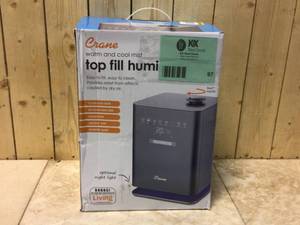 lot 97 image: 1.2 Gal. Warm & Cool Mist Top Fill Humidifier with Remote for Medium to Large Rooms up to 500 sq. ft by Crane Customer Returns See Pictures