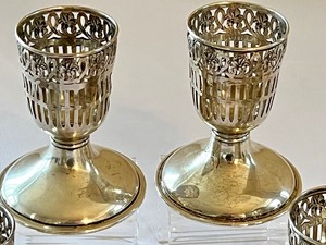 lot 8 image: Four Petite Sterling Stem Holders