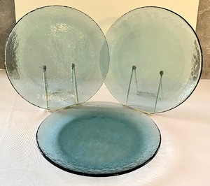 lot 81 image: Four Blue Fire and Light Glass Plates
