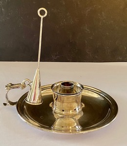 lot 40 image: Antique Chamberstick