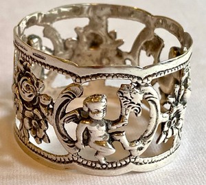 lot 393 image: Cupid Designed Sterling Vintage Napkin Ring