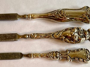lot 390 image: Three Vintage Sterling Nail Files