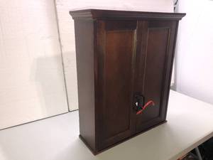 Home Decorators Collection Ashburn 23-12 in. W Bathroom Storage Wall Cabinet in Mahogany - good condition - review all pictures