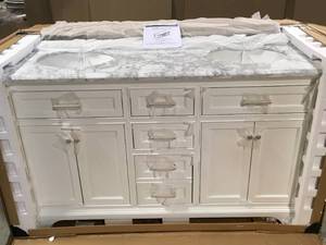lot 7 image: Windlowe 61 in. W x 22 in. D x 35 in. H Bath Vanity in White with Carrera Marble Vanity Top in White with White Sink by Home Decorators Collection Customer Returns See Pictures