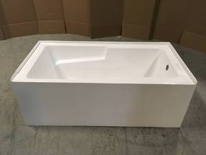 lot 20 image: Voltaire 60 in. x 30 in. Acrylic White, Alcove, Integral, Right-Hand Drain, Apron Rectangular Bathtub in White by Swiss Madison Customer Returns See Pictures