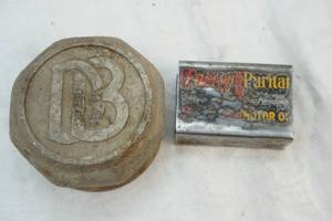 lot 22 image: antique Dodge Brothers bearing hub cover 3 and Puritan Oil Co. wall mount matchbox holder