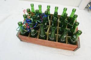 lot 112 image: vintage soda bottles in vintage soda bottle crate