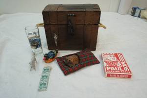 lot 129 image: wood treasure box with figurines inside