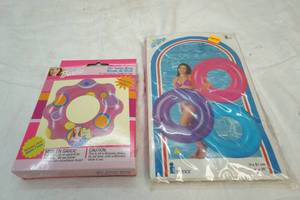 lot 139 image: Barbie and Intex water floaters