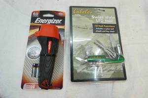 lot 187 image: Cabelas Swiss Style LED tool and flashlight