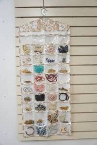 lot 254 image: hanging jewelry case with jewelry