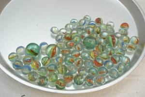 lot 305 image: glass marbles and shooters
