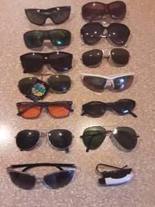 13-Pair Of Sunglasses & 1-Visor Clip