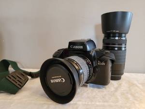 lot 215 image: EOS Elon Canon Film Camera & Lens