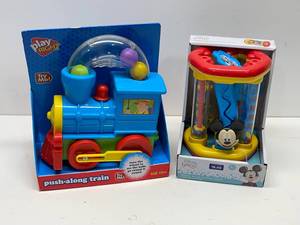 lot 3 image: New Push-Along Train and New Mickey Mouse Activity Center