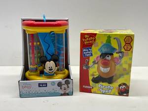 lot 4 image: New Mickey Mouse Activity Center and New Mr. Potato Head