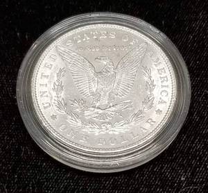 1886 MORGAN SILVER DOLLAR UNC IN AIRTITE