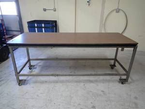 Nice wood table on wheels