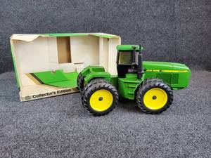 lot 12 image: ERTL John Deere 8760 4WD Tractor Die Cast 116 Scale Tractor with Original Box