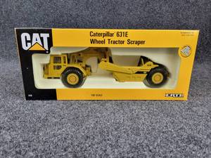 lot 24 image: ERTL Caterpillar 631E Wheel Tractor Scraper Die Cast 150 Scale in Original Box 1990 Collectors Edition